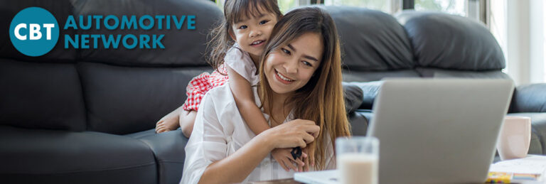 mother and child with laptop and glass of milk and CBT logo on top left
